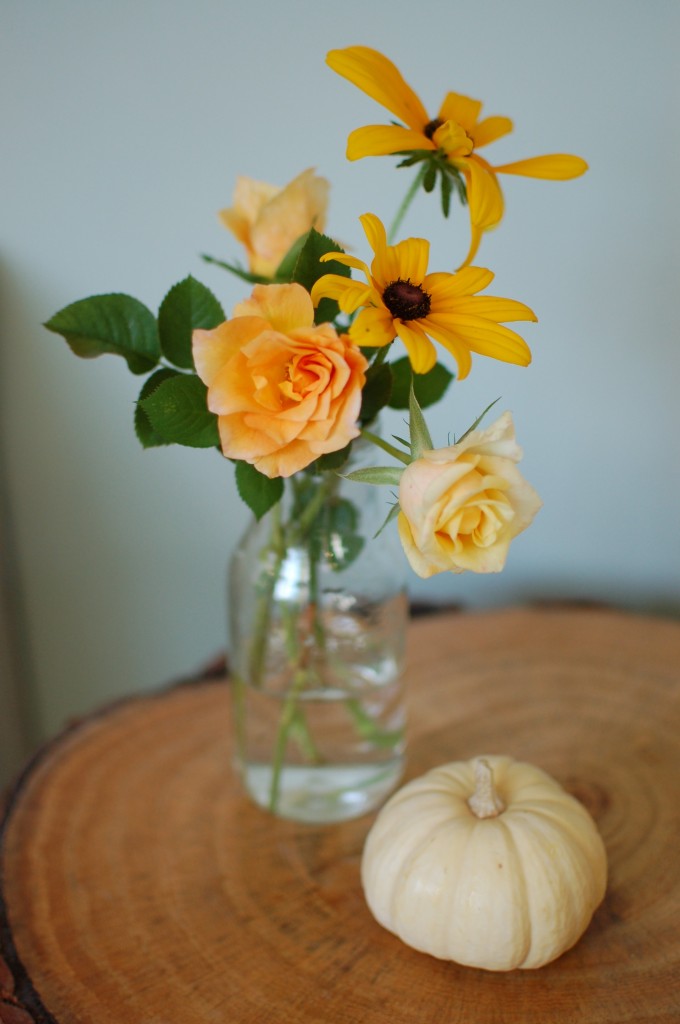 Flowers and a white pumpkin