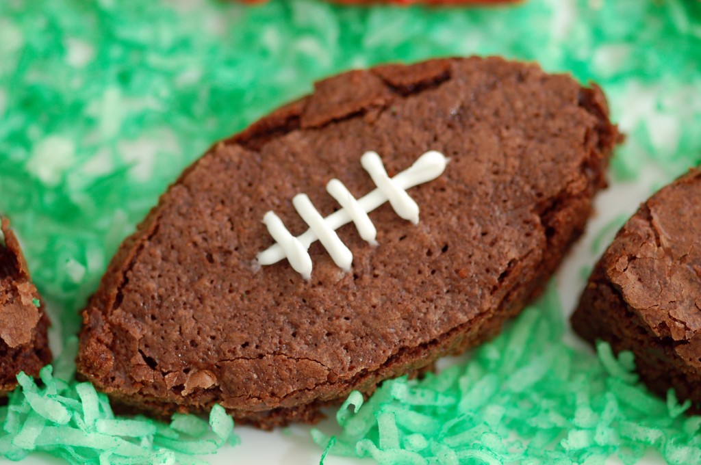 Brownie football with coconut grass